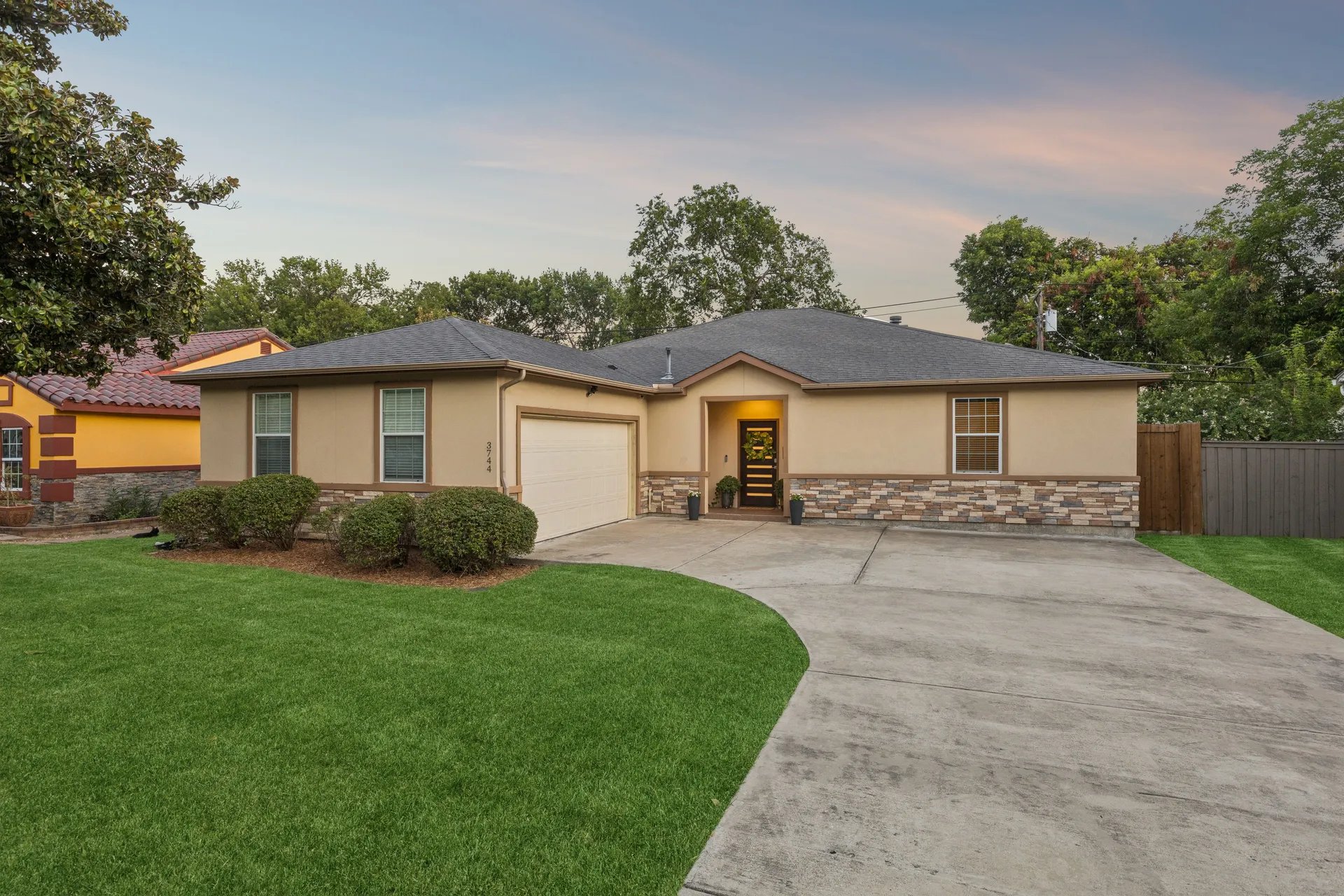 North Dallas home exterior at twilight