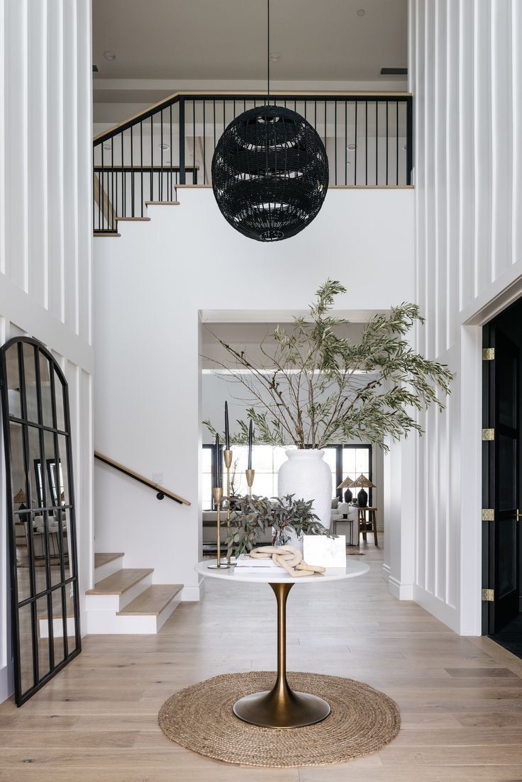 Entry foyer of a North Dallas home with a clean front door, trim, and hardware