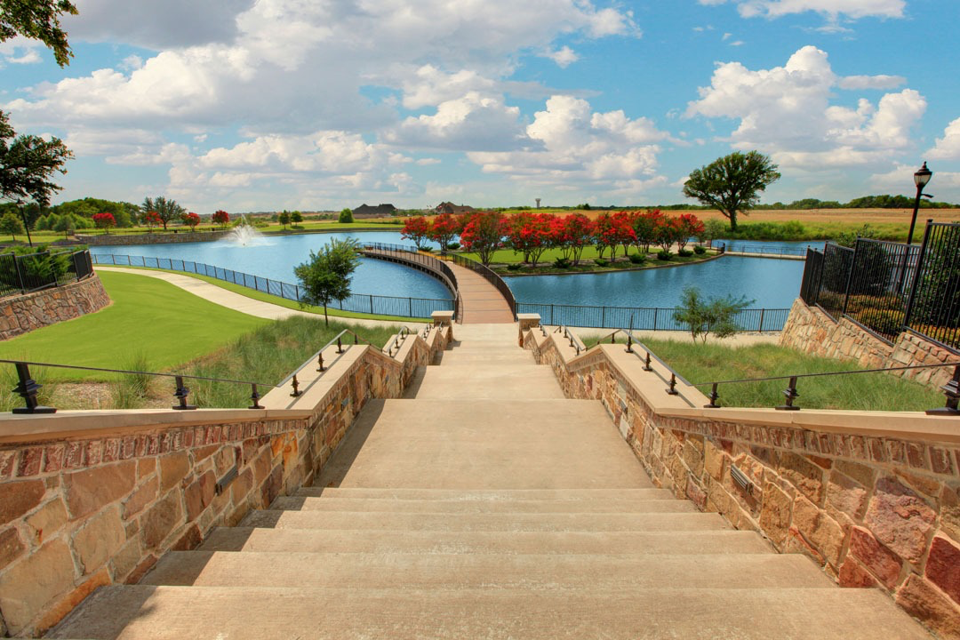 Stone staircase leading to the lake at Mustang Lakes
